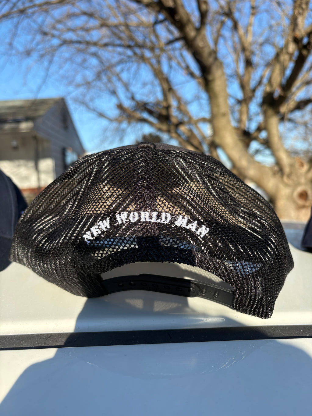 New World Man Trucker Hat